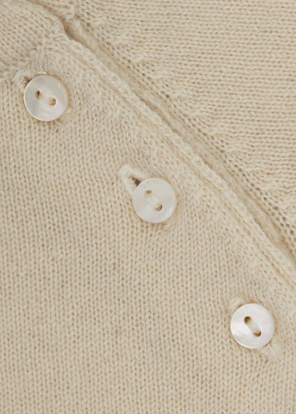 Détail du bouton en nacre du body bébé BOTIBOTY